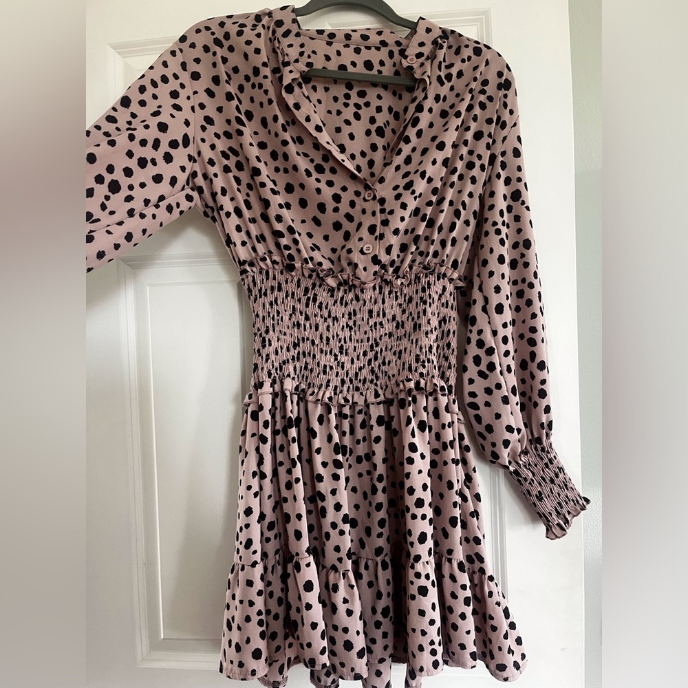 Cute comfy dress, the original tags are gone, but it is barely worn.